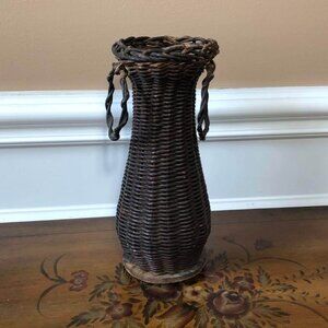 Antique wicker covered glass flask / vase with side rings
